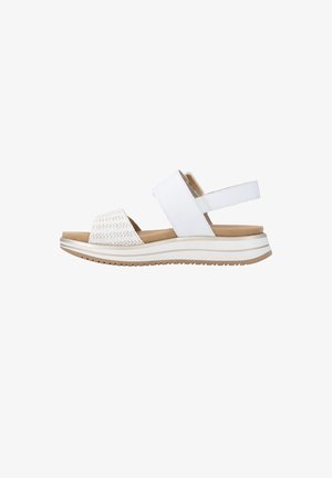 Sandale blanche pour femme avec une semelle plateforme basse, un bout ouvert, une bride avant tressée et une bride arrière ajustable sur fond blanc.