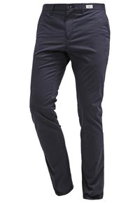 Pantalon bleu marine en mélange de coton, avec une texture lisse, coupe slim, poches avant et fermeture à bouton avec étiquette de marque.