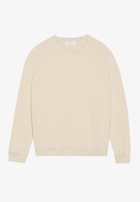 Beige sweatshirt met ronde hals en raglanmouwen, zachte textuur en geribbelde zoom. Heeft een kruissteekdetail op de halslijn.