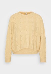 Pull en maille torsadée couleur jaune pâle, avec des manches longues, un col rond et un ourlet court. Fabriqué en tissu doux et texturé.