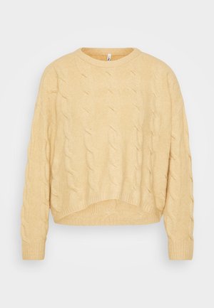 Pulover s pletenim uzorkom u svijetlo žutoj boji, s dugim rukavima, okruglim izrezom i skraćenim rubom. Izrađen od mekog, strukturiranog materijala.