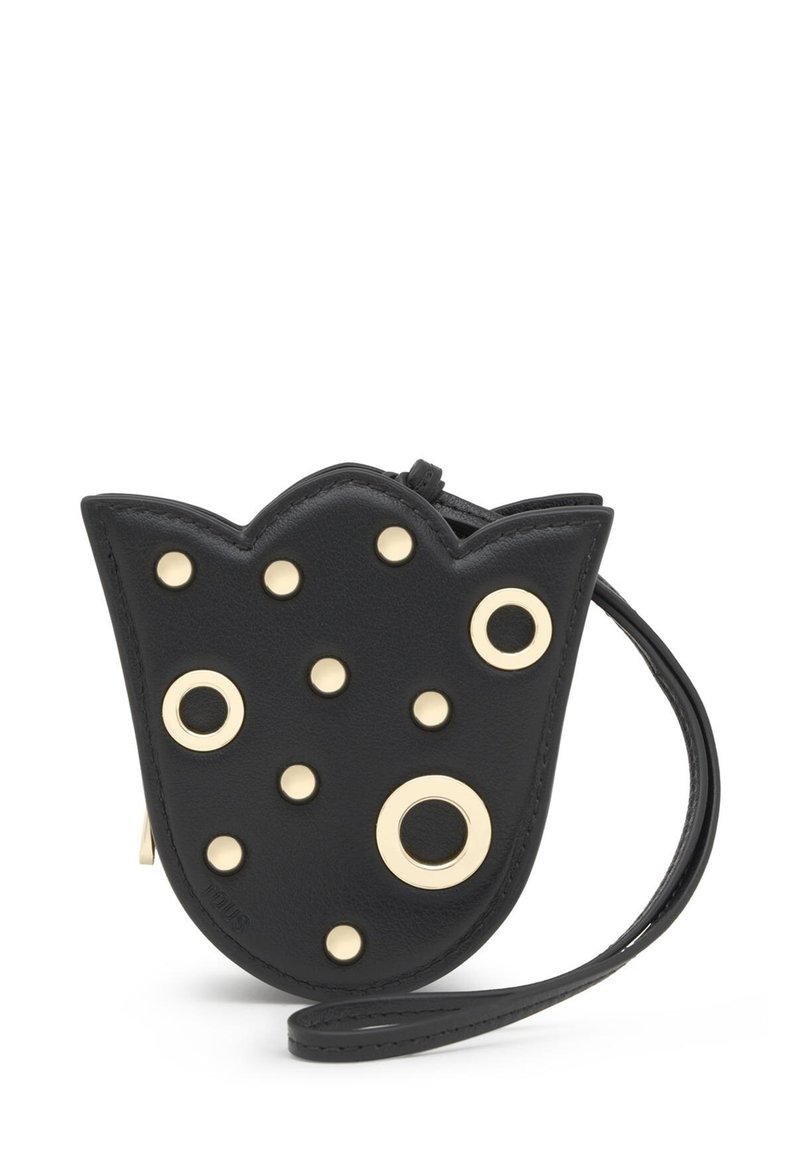 Czarny skórzany pokrowiec w kształcie tulipana, z ozdobami ze złotego metalu, okrągłymi ćwiekami oraz paskiem na nadgarstek. Gładka faktura z falistymi krawędziami.