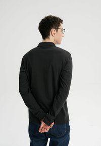 MELA LANGARM DIVIT - Poloshirt - schwarz