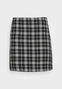 Svart och vit rutigt mini kjol gjord av texturerat tyg, med rak passform och en subtil nederkant.