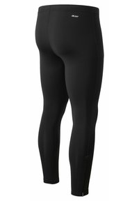 Zwarte sportleggings met een lichaamsnauwe pasvorm, een gladde textuur en een ritsdetail bij de enkel. Inclusief vochtafvoerende stof voor comfort.