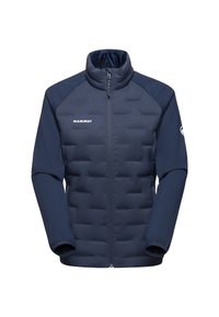 Mörkblå jacka med en vadderad body i quiltat tyg och släta ärmar, hög krage, framzipper och logotypen "MAMMUT" på bröstet.