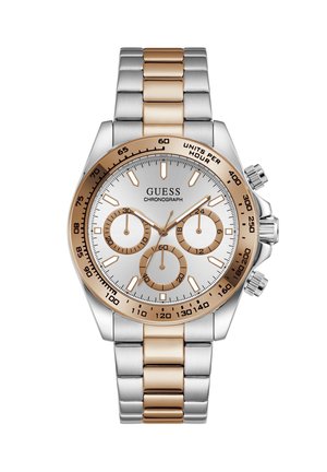 Montre chronographe en métal bicolore avec lunette et accents en or rose, cadran argenté, trois sous-cadrans et échelle tachymètre sur la lunette.