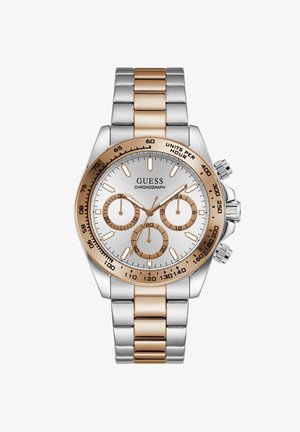 Montre chronographe en métal bicolore avec lunette et accents en or rose, cadran argenté, trois sous-cadrans et échelle tachymètre sur la lunette.