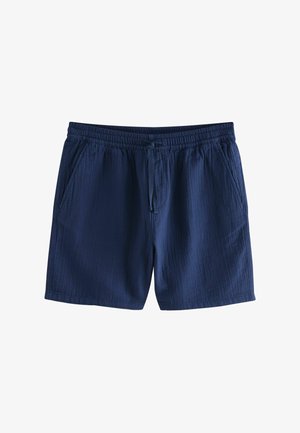 Marineblå shorts lavet af tekstureret stof, med elastisk talje og snøre samt sidelommer. Enkel, afslappet design.