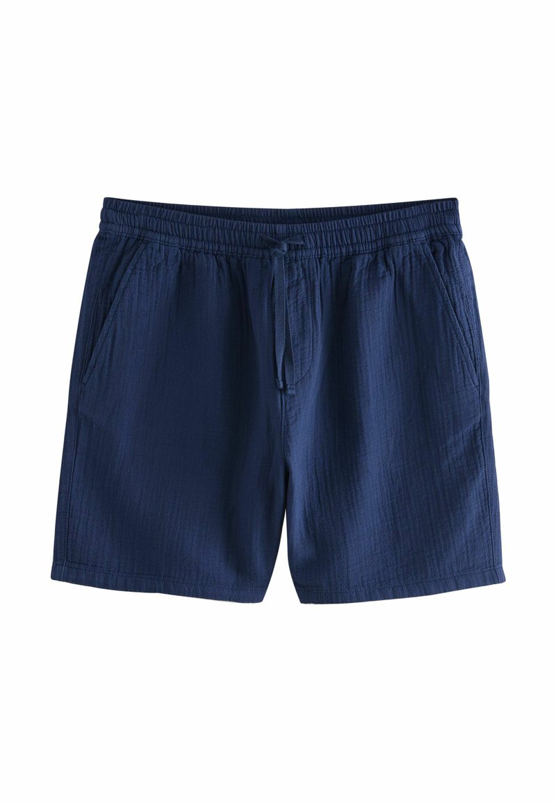 Shorts bleu marine en tissu texturé, avec une taille élastique dotée d'un cordon de serrage et des poches latérales. Design simple et décontracté.