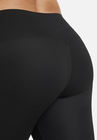 Nike Performance UNIVERSA - Tights - black black