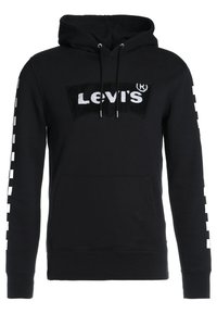 Felpa con cappuccio nera con un grande logo Levi's bianco ricamato. Tessuto morbido, cappuccio regolabile con coulisse e dettagli a motivo a scacchi ai lati.