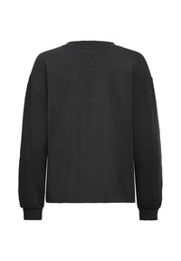 Haut noir à manches longues, coupe décontractée, avec un col rond et des poignets côtelés, en tissu doux et texturé.