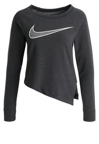 Dunkelgrauer Langarm-Sweatshirt mit einem weißen Nike Swoosh-Logo, asymmetrischem Saum und seitlichen Schlitzen für ein modernes Design.