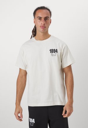 MANCHESTER CITY ROSE TEE - Club wear - off white