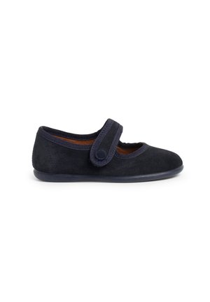 Navy blue suede shoe featuring a wide strap with a round button, round toe, and a flexible rubber sole. Smooth texture with stitched accents.