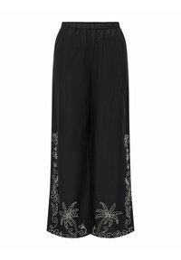 Črne hlače širokih nog z elastičnim pasom, okrašene z belo cvetlično vezenino ob robu, izdelane iz lahkega, teksturiranega blaga.