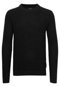 Suéter negro de punto con cuello redondo, mangas largas, tejido texturizado y puños y dobladillo acanalados. Sin patrones ni acentos adicionales.