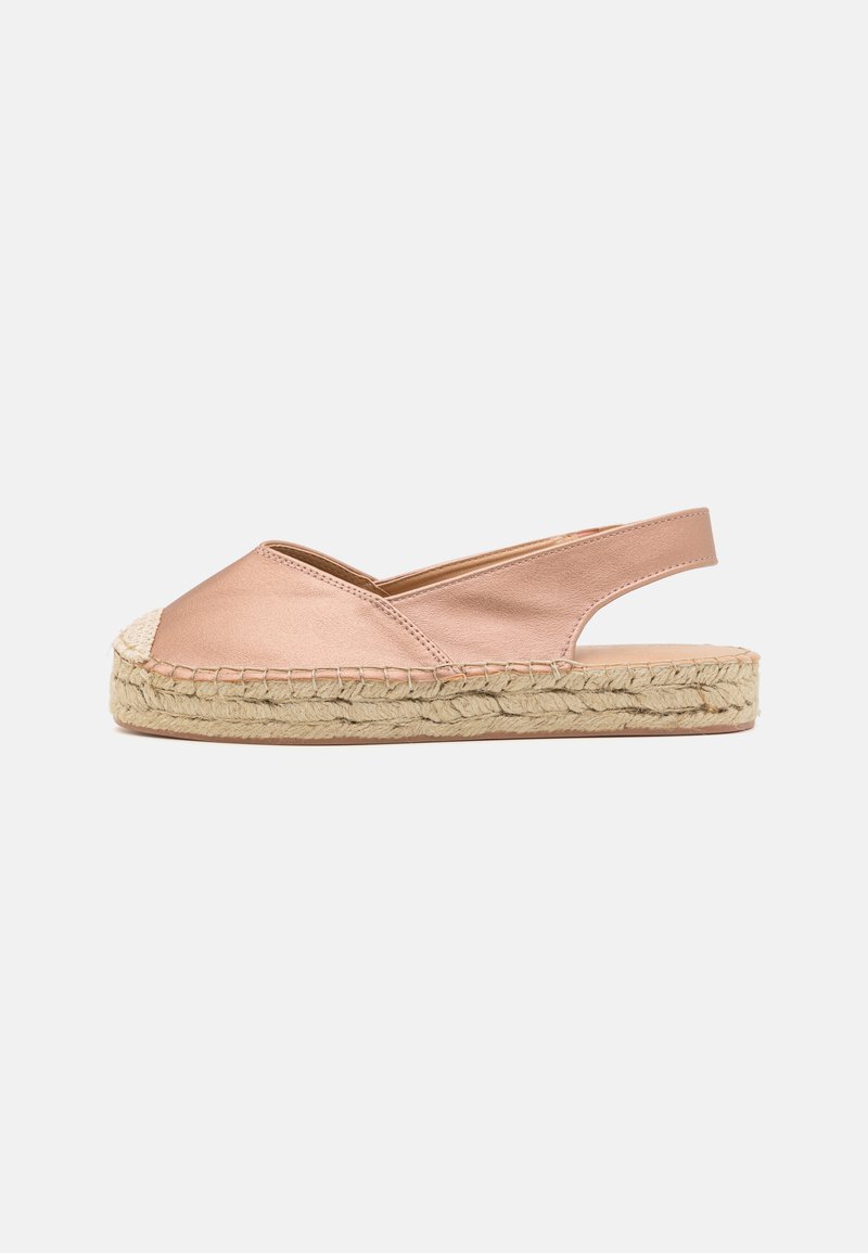 Růžové kožené espadrilky s pletenou juteovou podrážkou a otevřenou zadní částí. Disponují zaoblenou špičkou a křížovým páskovým designem. Hladký povrch.