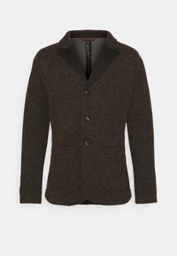 Brązowa teksturowana kurtka z wyciętym kołnierzem, trzema guzikami i dwoma przednimi kieszeniami. Wykonana z tkaniny tkanej z subtelnymi wzorami.