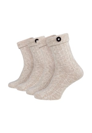Beige Stricksocken mit einem gerippten Muster und dekorativen schwarzen Knöpfen an den Bündchen. Im Set von vier Paaren verkauft.