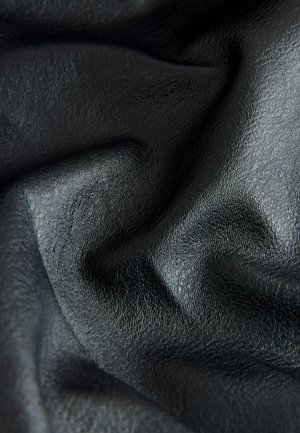 Black textured leather with a wrinkled appearance, showcasing a smooth finish and subtle patterns across the surface.
