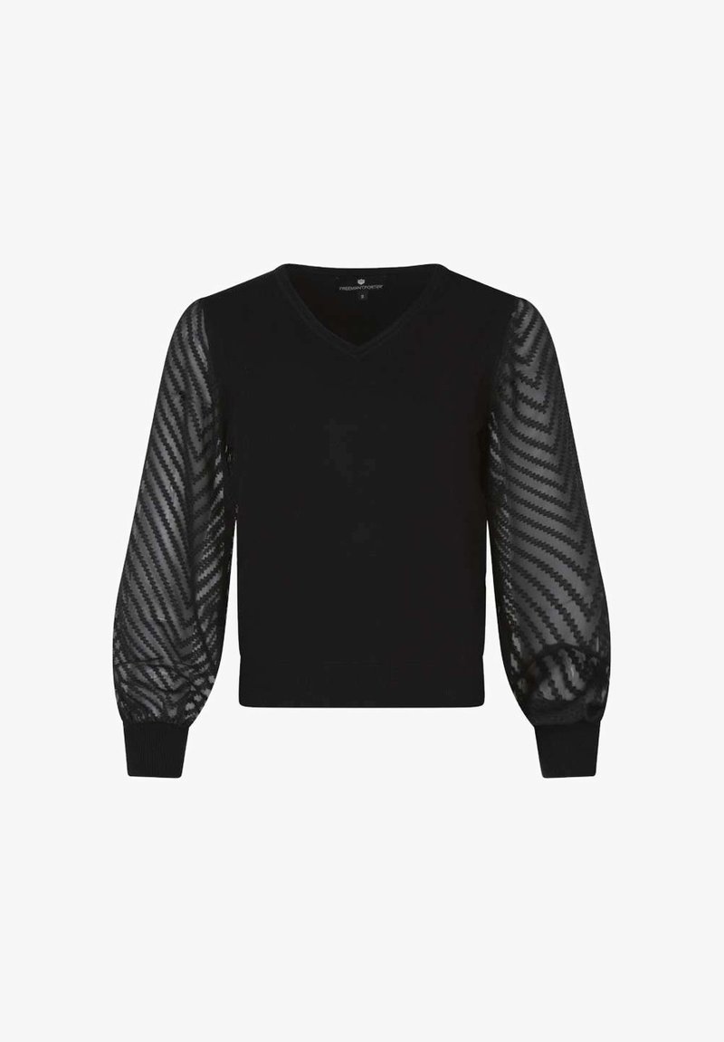 Black V-neck sweater with solid knit body and sheer, puffed long sleeves featuring a chevron pattern and fitted cuffs.