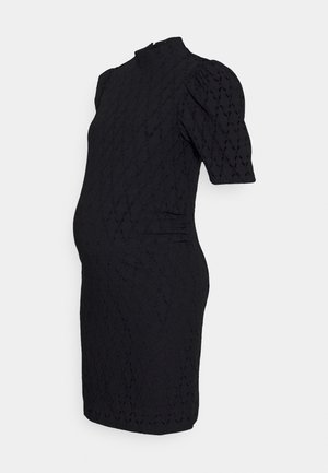 Black knitted dress with a high neckline, puff sleeves, and a form-fitting silhouette. Features a textured diamond pattern throughout.