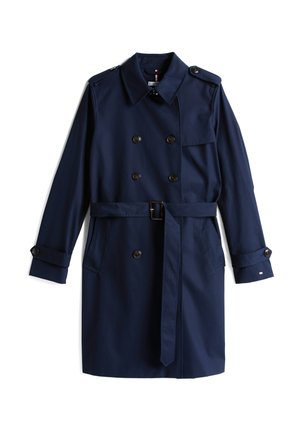 Navyblauwe trenchcoat met een dubbelzijdig ontwerp, schouderepauletten, lange mouwen en een ceintuur in de taille. Voorzien van grote bruine knopen en zakken.