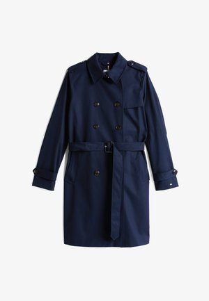 Navyblauwe trenchcoat met een dubbelzijdig ontwerp, schouderepauletten, lange mouwen en een ceintuur in de taille. Voorzien van grote bruine knopen en zakken.