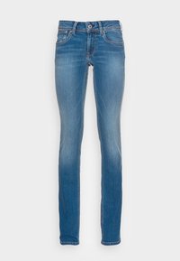 Slim-fit blå denimjeans med fem fickor, dragkedja och kontrasterande orange sömmar. Tyget har en slät yta och en lätt blekning.