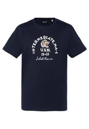 Donkerblauw T-shirt met een grafische afbeelding van een brullende tijger en witte tekst voorop met de tekst "INTERMEDIATE MA-1 U.S.N. 19-13 Schott Bros mc".