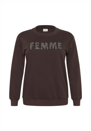 Sweatshirt marron avec un col rond et des manches longues. Le mot "FEMME" est affiché en lettres étincelantes sur le devant.