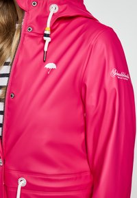 Schmuddelwedda Parka - himbeerpink