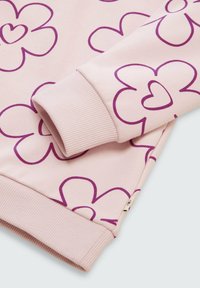 Rosa sweatshirt med stort lila blommönster, med ribbade manschetter och nederkant. Mjuk material med en slät yta.
