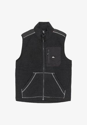 Chaleco de forro polar negro con cuello alto, cremallera frontal y dos grandes bolsillos laterales. Cuenta con un pequeño bolsillo con cremallera en el pecho. Acentos de costura blanca.