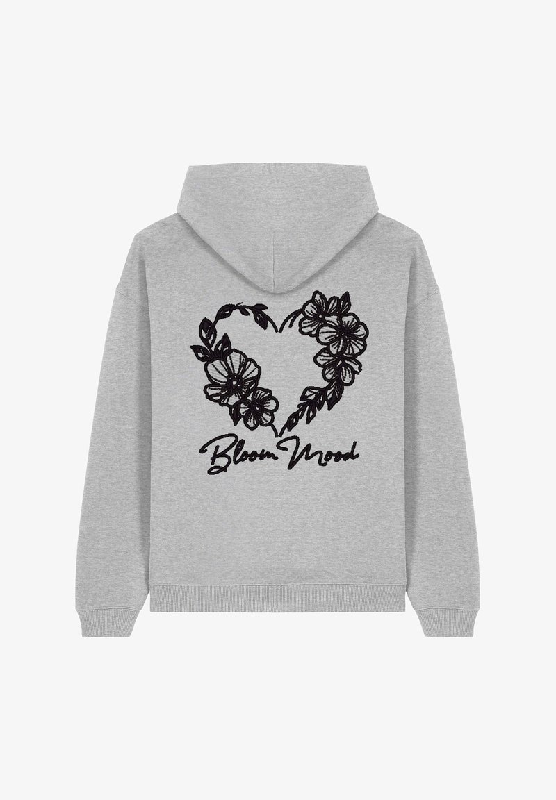 Gray hoodie with a black floral heart design on the back, featuring the text "Bloom Mood" in a casual script font. Soft fabric and relaxed fit.