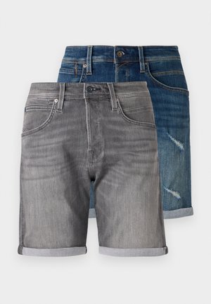 Denim shorts in dark blue and grey. Features include rolled hems, pockets, and a faded texture on the blue pair with distressed detailing.