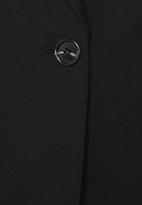 ARKET Casaco curto - black