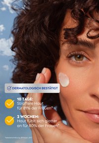 Facial cream application on skin; smooth, creamy texture; model has curly dark hair; light background with clouds; includes text details.