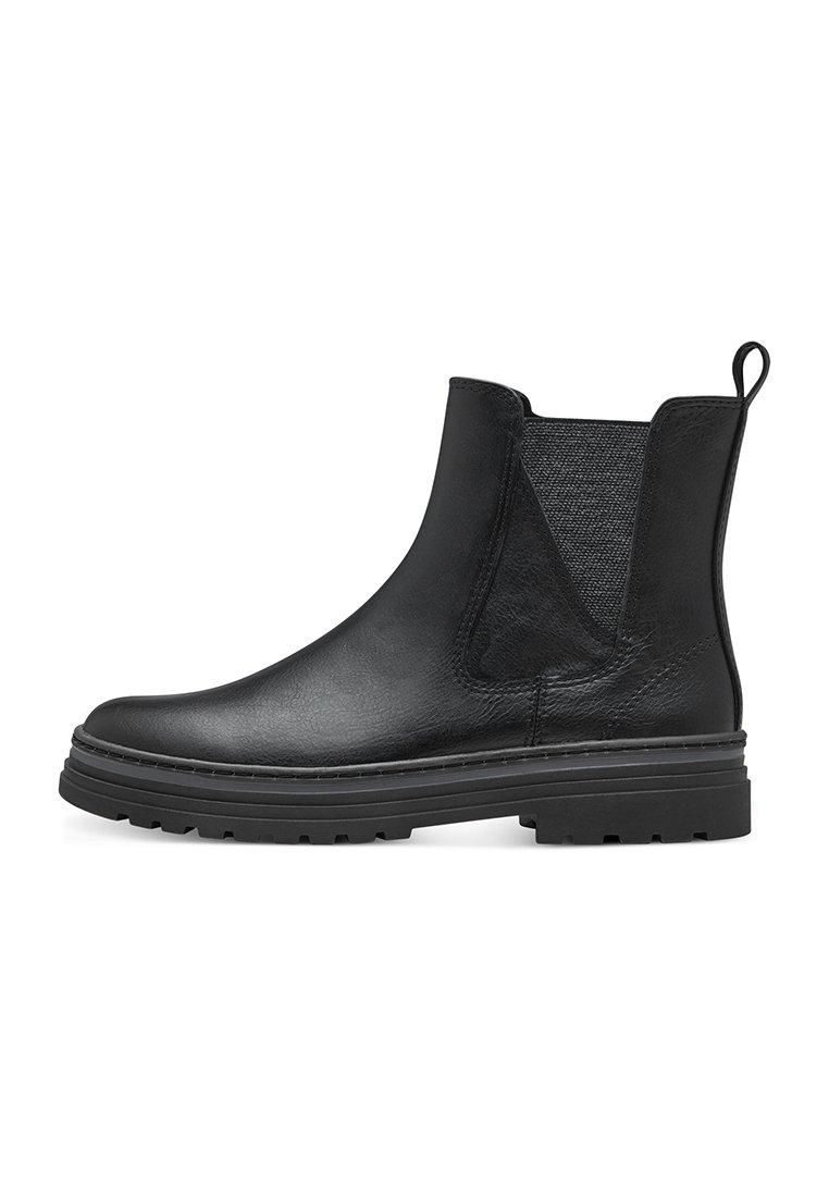 Bottines Chelsea en cuir noir avec panneaux élastiques sur les côtés, finition texturée et semelle en caoutchouc épaisse. Comprend une languette pour un enfilage facile.