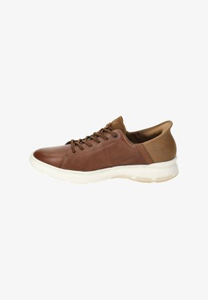 Brown leather sneaker with a smooth finish, padded collar, white midsole, and textured accents at the heel. Laces for secure fitting.