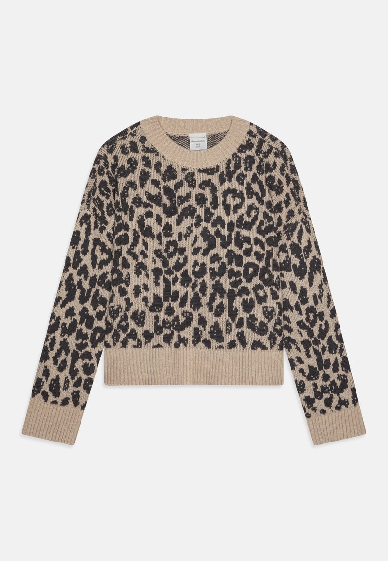 Beige tröja med ett svart leopardmönster, ribbad mudd och nederkant, samt rund halsringning. Mjuk stickad textur med lång ärm.