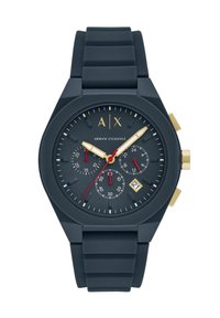 Tamno plavi silikonski sat s okruglom kućištem, zlatnim detaljima, tri podbroja i prikazom datuma. Ima velike, lako čitljive brojeve.