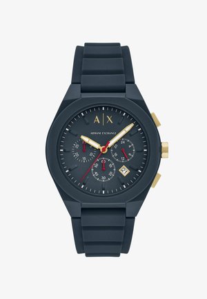 Dunkelblaues Silikonarmband mit einem runden Gehäuse, goldenen Akzenten, drei Unterdials und einer Datumsanzeige. Verfügt über große, leicht ablesbare Ziffern.