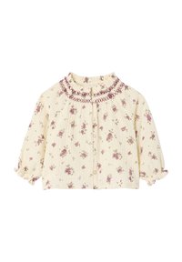 Floral button-up blouse in cream fabric, featuring pink and green flower patterns, smocked neckline, and puffed sleeves with elastic cuffs.