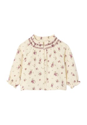 Blumenmuster-Bluse aus cremefarbenem Stoff mit rosa und grünen Blumenmustern, gerafftem Ausschnitt und puffärmeligen, elastischen Bündchen.