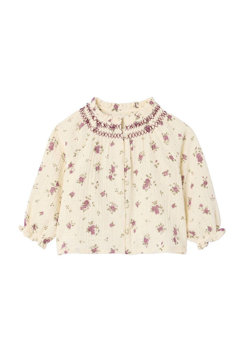 Floral button-up blouse in cream fabric, featuring pink and green flower patterns, smocked neckline, and puffed sleeves with elastic cuffs.