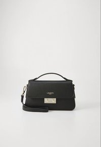 Black Lacoste handbag with a textured finish, gold hardware, a top handle, and a removable shoulder strap. Compact rectangular shape.