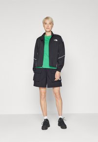 The North Face HAKUUN WIND JACKET Outdoorjacke black